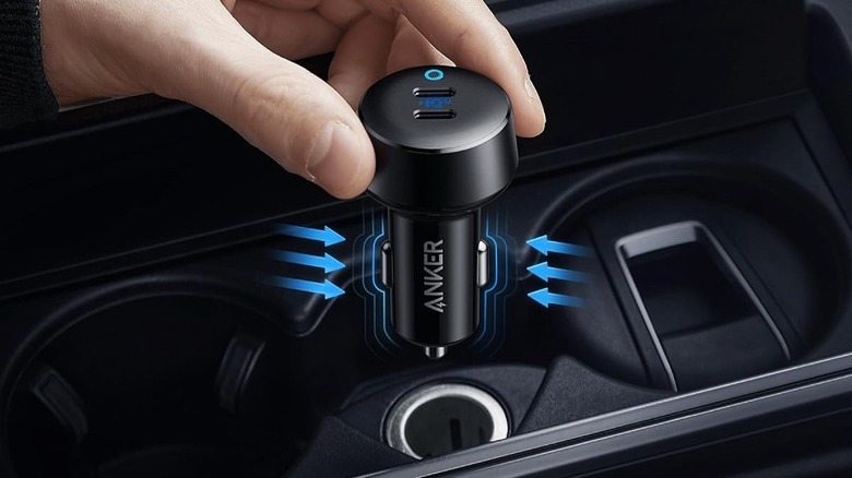 Anker PowerDrive III Duo USB adapter plugged into car port.