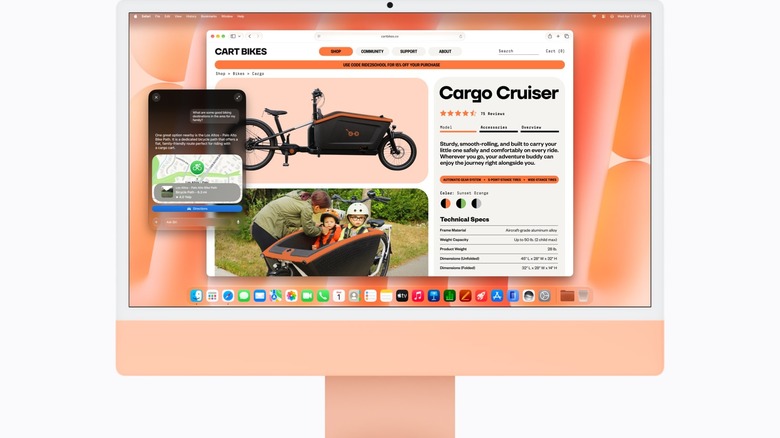 Orange iMac system with a web browser open on screen