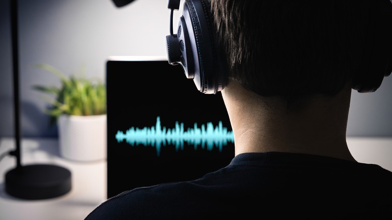 A concept of creating a deepfake voice with a computer program.