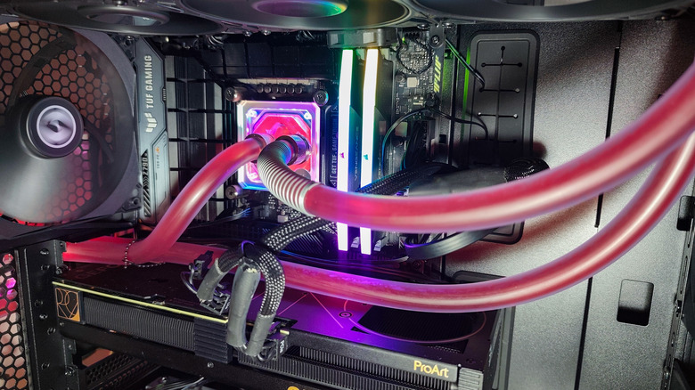 A liquid cooling loop running in and out of a CPU water block.