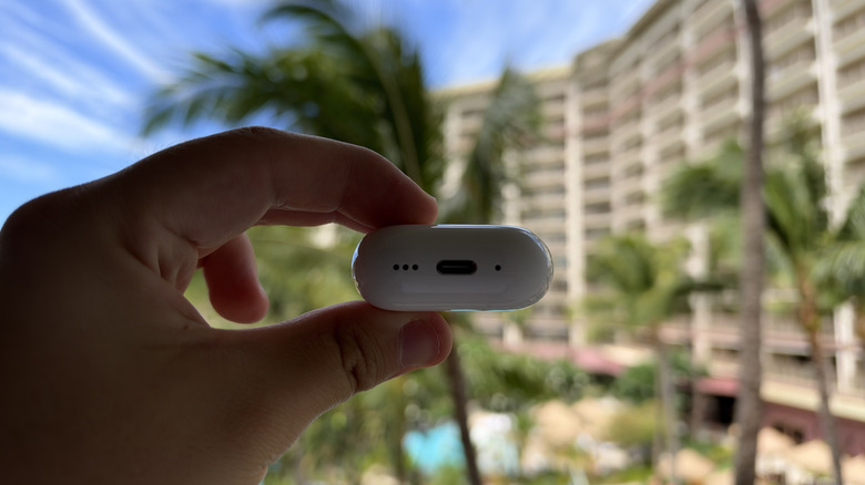 Close-up photo of the USB-C charging port on the bottom of AirPods 5