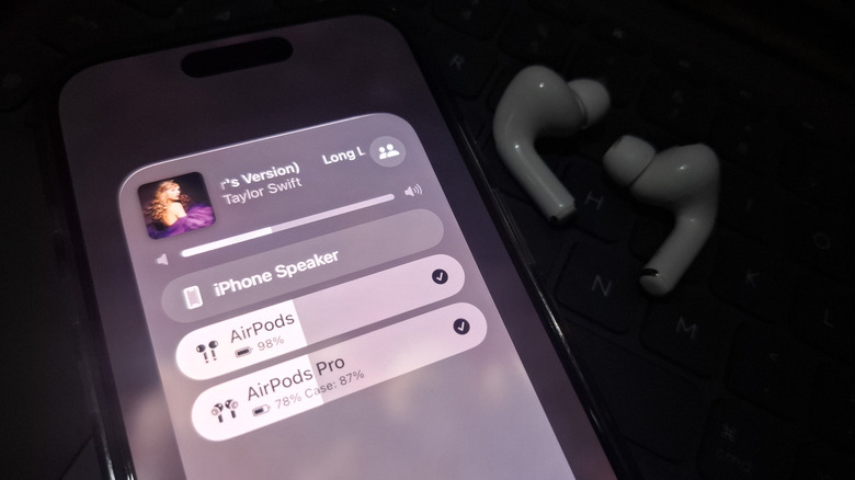 iPhone showing two AirPods in the Now Playing panel