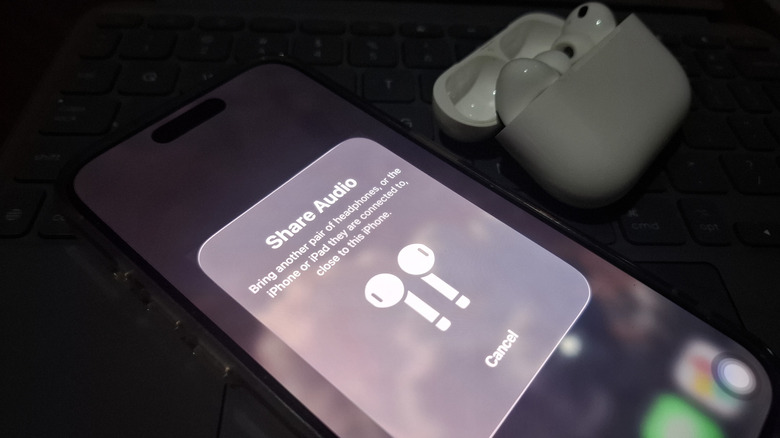 iPhone showing Share Audio pop up next to AirPods Pro
