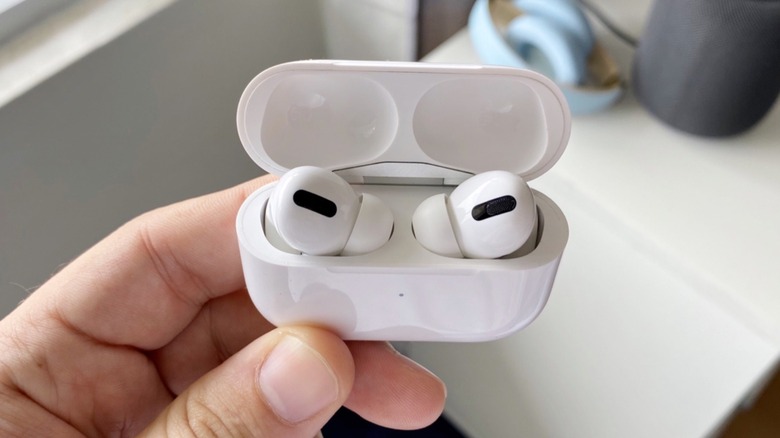 Apple's AirPods Pro earbuds in their wireless charging case