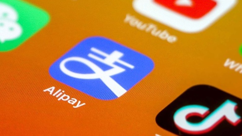 Screenshot of a phone's app screen showing Alipay, TikTok, YouTube, and WeChat