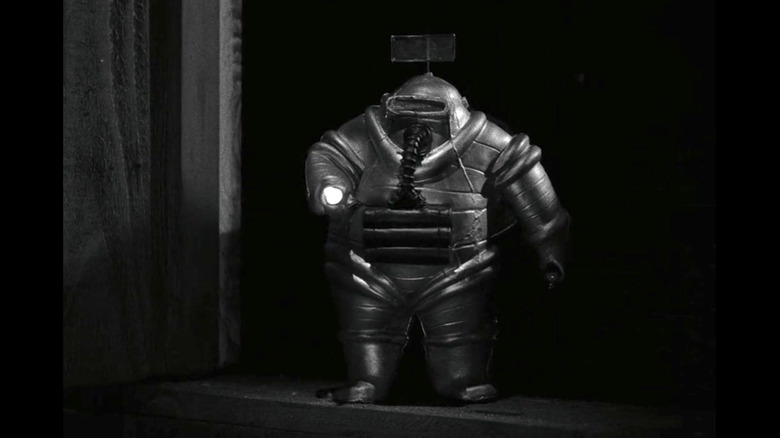 An astronaut in a rotund spacesuit