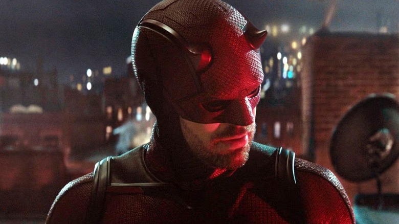 Daredevil in full suit, wondering