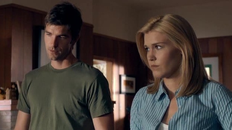 Nathan Wuornos and Audrey Parker standing in a kitchen.