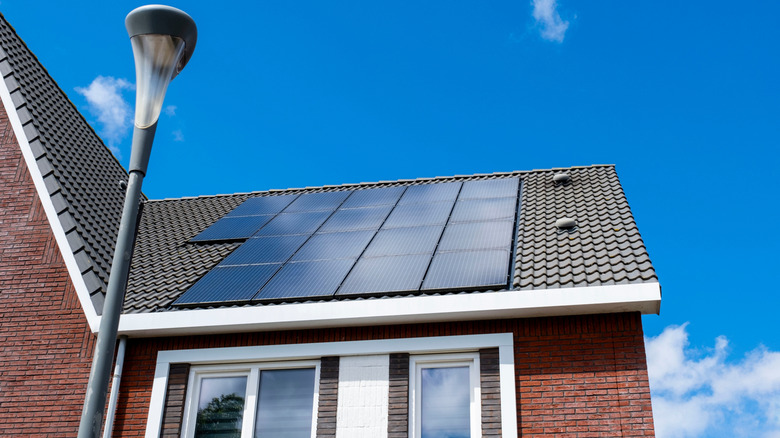 a house with solar panels on the roof