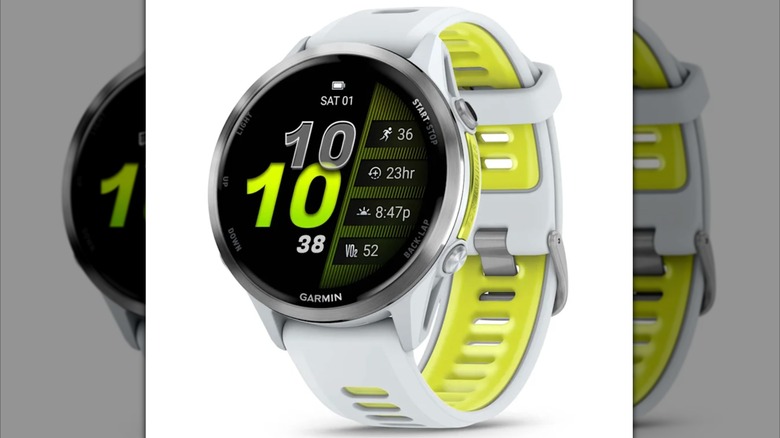 A white and neon green Garmin Forerunner 970 smartwatch.