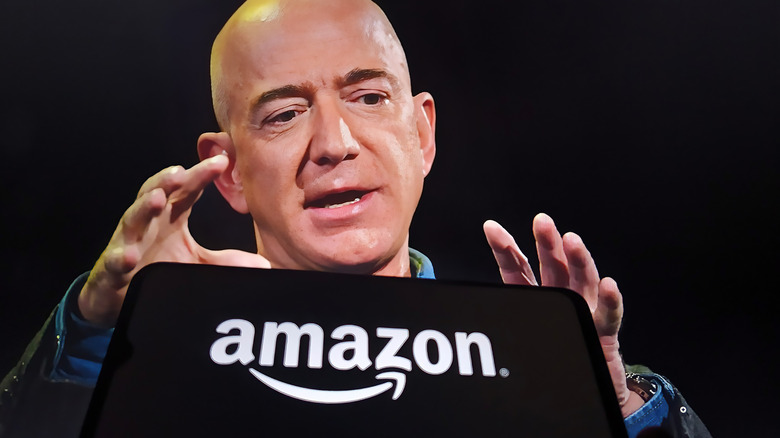 Jeff Bezos and the Amazon logo