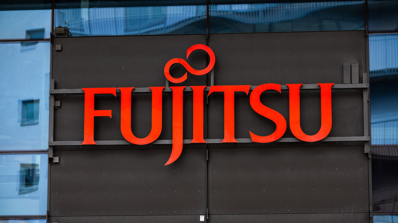 Fujitsu logo in red on a building