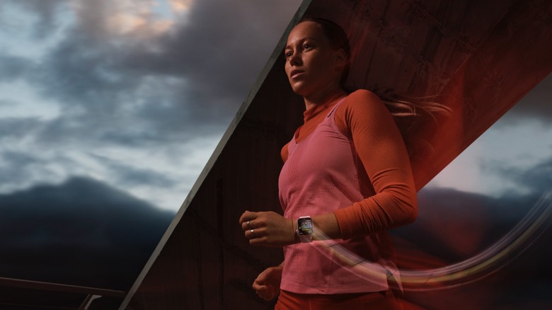 Artistic depiction of a woman running while wearing an Apple Watch Series 9 in front of a mountainous background