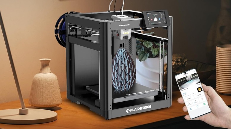 Flashforge Adventurer 5M enclosed 3D printer with project ongoing