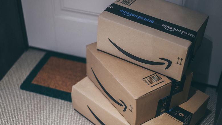 Amazon boxes outside of a door