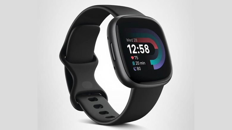 An Amazon promotional photo for the Fitbit Versa 4 smartwatch with the Black/Graphite color option