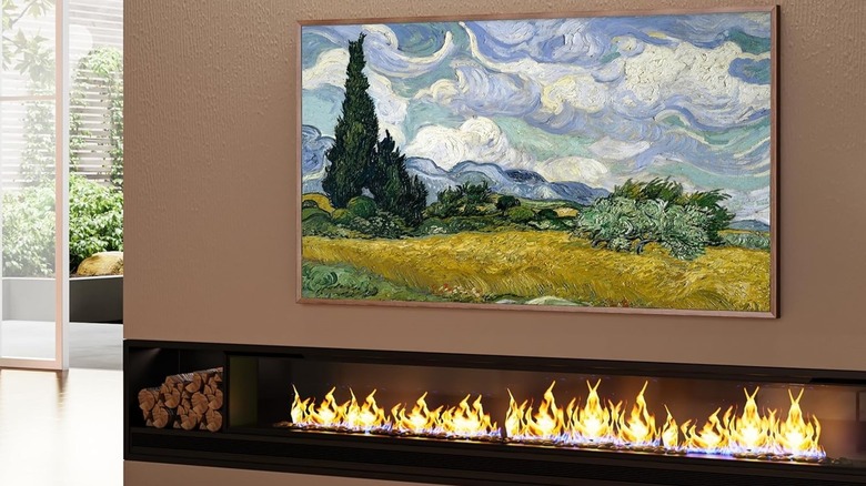 Hisense 55 CanvasTV frame-like TV mounted above a fireplace as art
