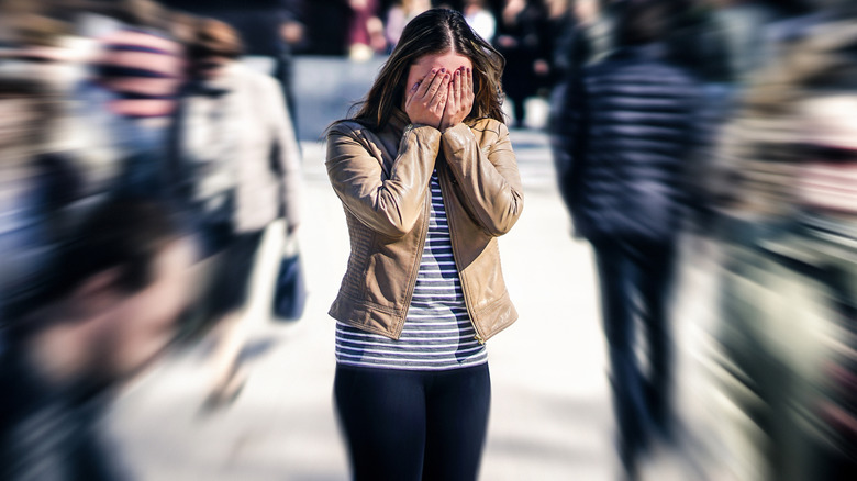 A woman having social anxiety in public