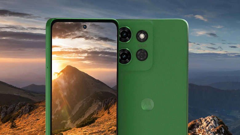 Motorola Moto G Power 2025 in forest green with mountain background
