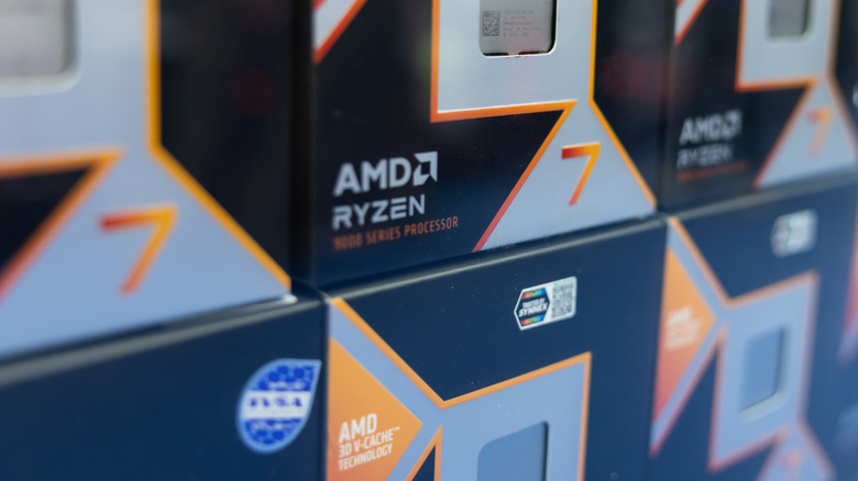 A stack of AMD Ryzen X3D processors inside their boxes