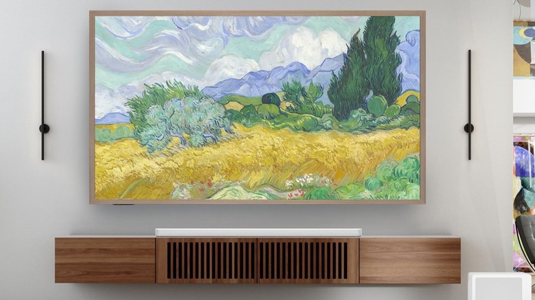 Hisense CanvasTV mounted in the living room with screen on and artwork showing.