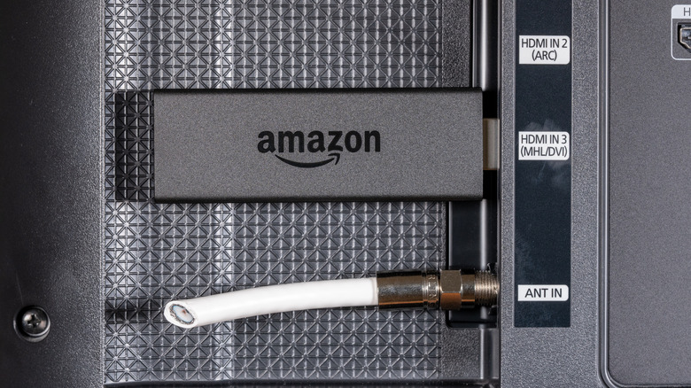 An Amazon Fire TV Stick connected to a TV.