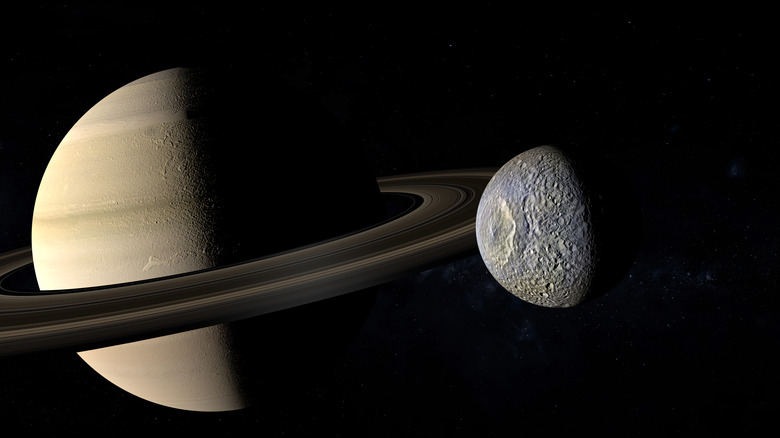 Saturn (left) and one its moons, Mimas (right).