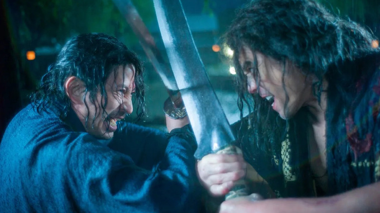 Shujiro and Bukotsu clashing with their swords