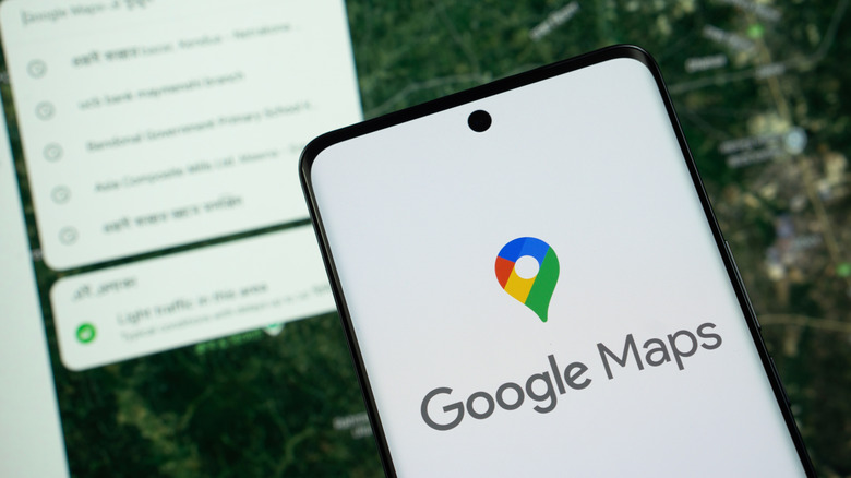Google Maps logo on a phone screen