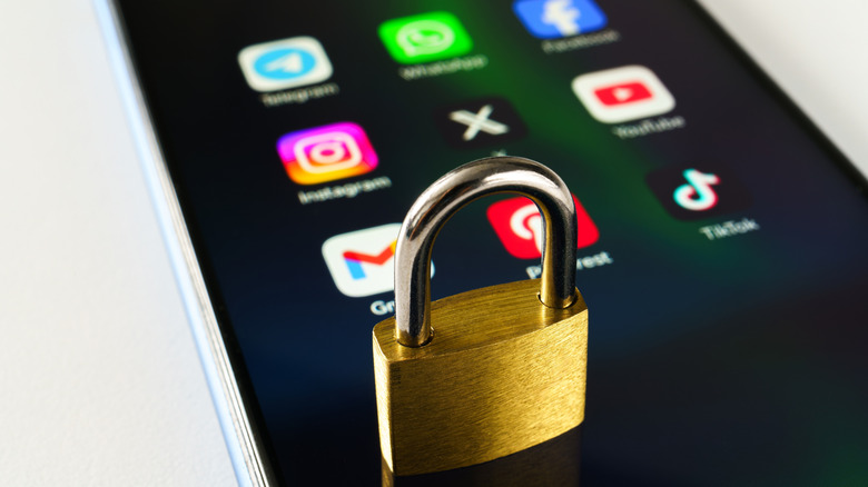 Concept of a locked down phone, padlock on a smartphone