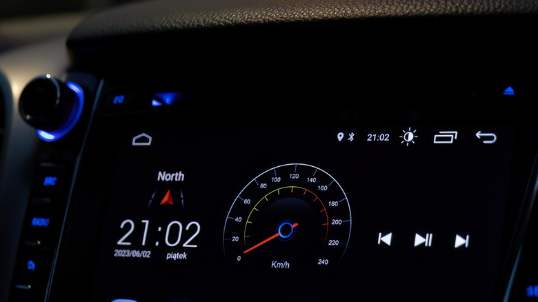 A closeup of a vehicle's infotainment screen displaying an older version of Android Auto