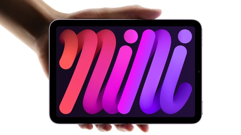 iPad mini 7 in hand.