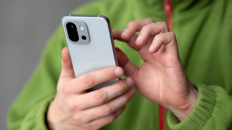 A person using an Android phone.