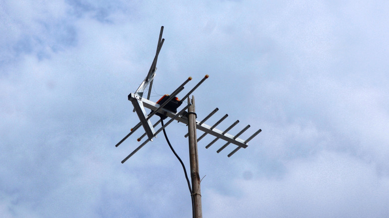 A TV antenna mounted to a roof.