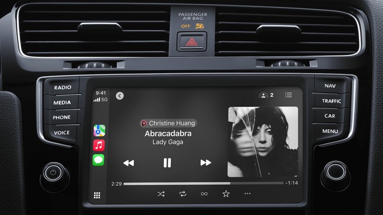 Apple CarPlay playing Abracadabra by Lady Gaga in a car.