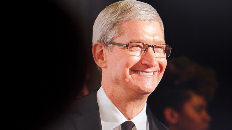 Tim Cook smiling in front of a crowd.