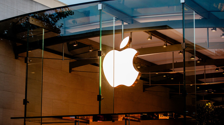 Illuminated Apple logo outside of retail store