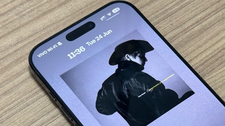 iOS 26 Apple Music on iPhone 16 Pro Max Lock Screen
