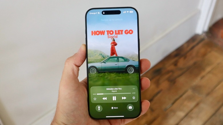 iOS 26 Apple Music on iPhone 16 Pro Max Lock Screen