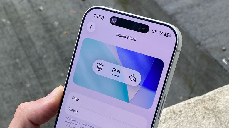An iPhone 17 Pro Max highlighting a Liquid Glass setting
