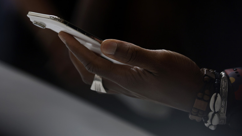 The ultra-thin iPhone Air in hand.
