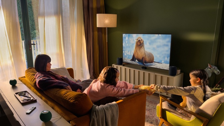 New Apple TV 4K in a living room with content on the TV screen