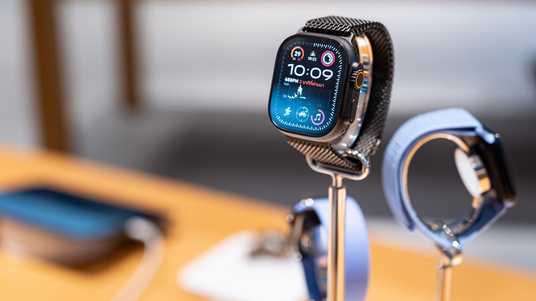 An Apple Watch Ultra on a stand.