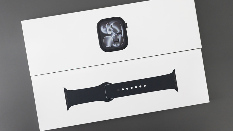 Packaging for an Apple Watch Series 11, with the watch and band printed on it.