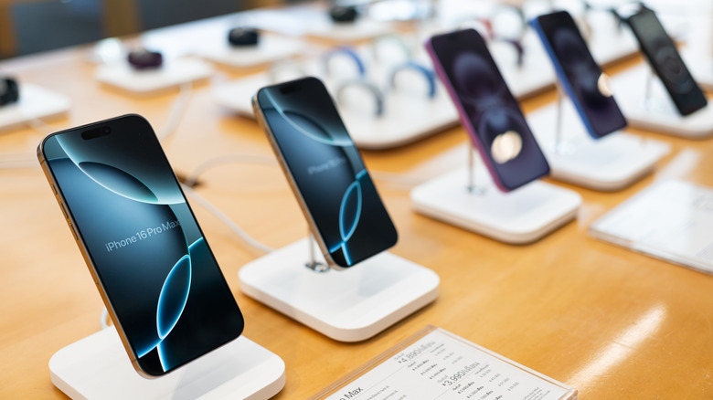 A series of iPhone devices on display