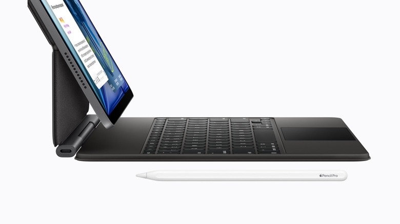 An iPad Air with the Magic Keyboard attached and the Apple Pencil Pro