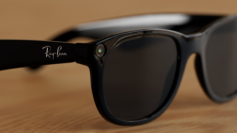 Closeup of the Meta Glasses with Ray-Ban logo and the built-in ultra-wide 12 MP camera.
