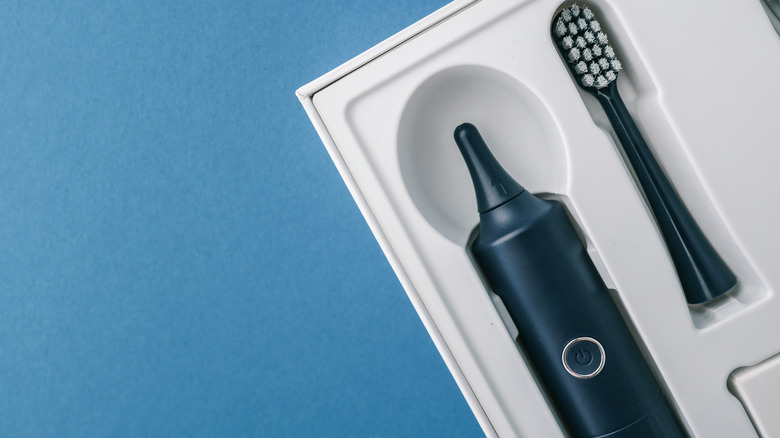 Closeup of an electric toothbrush.