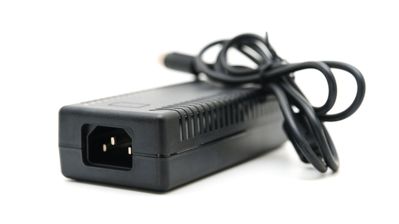 A laptop power adapter.