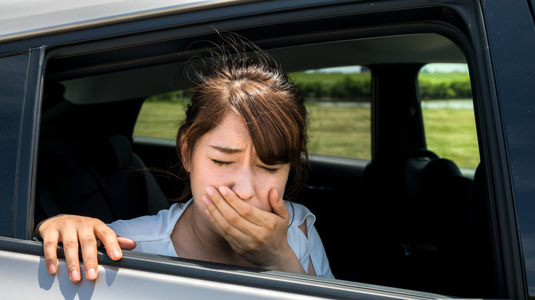 Woman feeling carsick